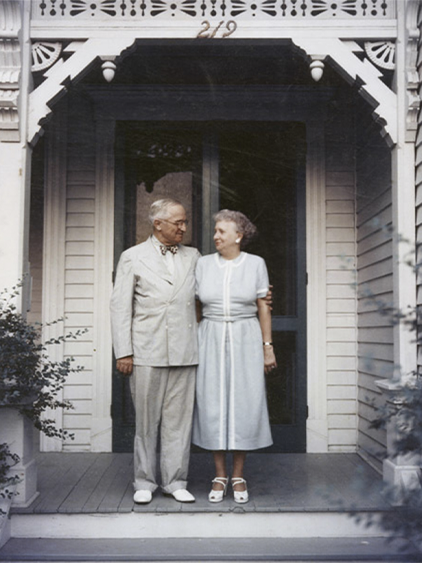 Image of Harry and Bess Truman on the front porch on Delaware Street.